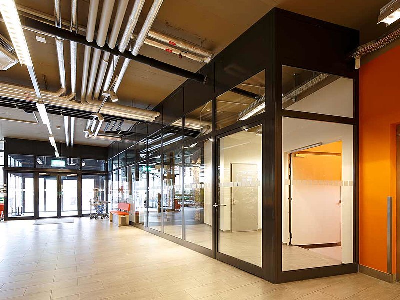 fire-rated glazed doors, sliding door with escape-route function and glazing EI30, forster fuego light
Residential and commercial building Krone, Switzerland