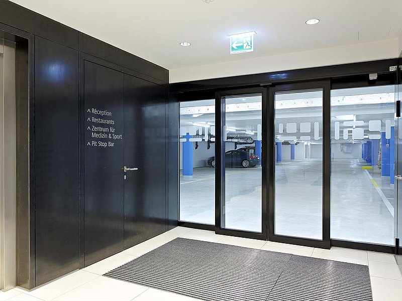 flush mounted fire-resistant steel door and automatic sliding door EI30.
System: forster fuego light
Hotel Säntispark, Switzerland